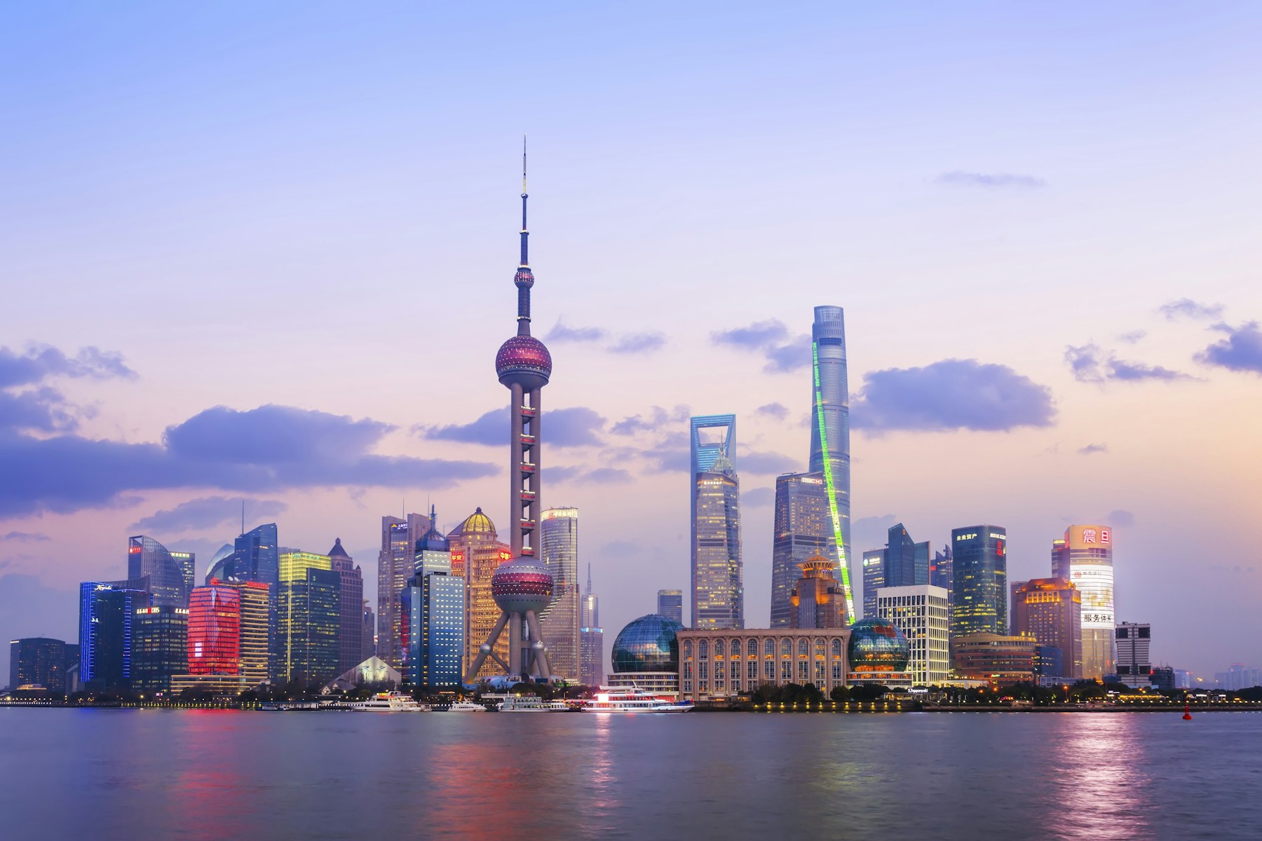 Shanghai skyline and Oriental Pearl Tower beside the Huangpu River